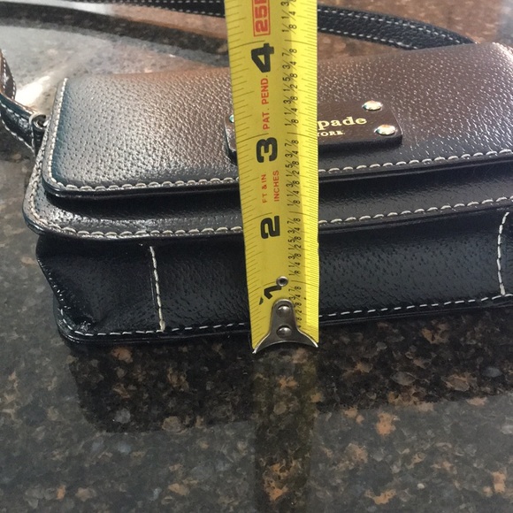 Lovely, Mint condition black leather Kate Spade crossbody purse. - Picture 6 of 10